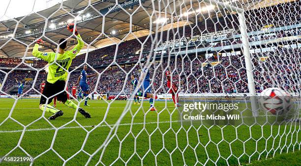 Robin Knoche of Wolfsburg celebrates after scoring his team's second goal during the Bundesliga match between VfB Stuttgart and VfL Wolfsburg at...