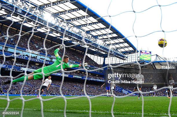 Robert Green of Queens Park Rangers fails to save a goal by Oscar of Chelsea during the Barclays Premier League match between Chelsea and Queens Park...