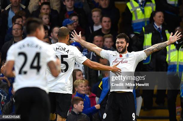 Charlie Austin of Queens Park Rangers celebrates his goal during the Barclays Premier League match between Chelsea and Queens Park Rangers at...