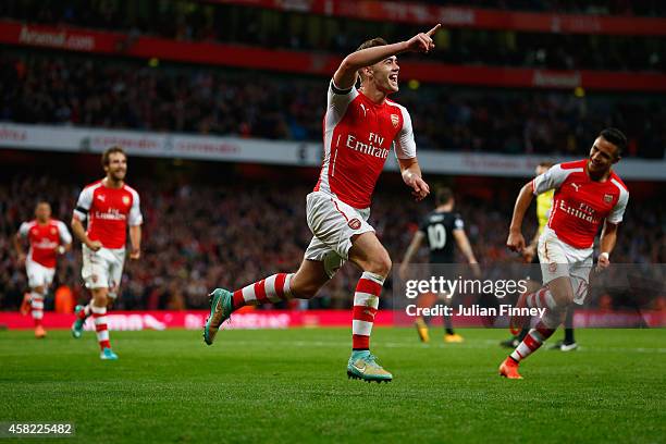 Calum Chambers of Arsenal celebrates scoring the second goal for Arsenal during the Barclays Premier League match between Arsenal and Burnley at...