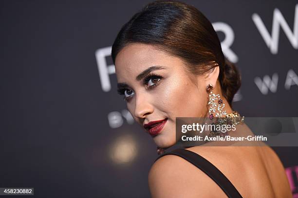 Actress/model Shay Mitchell arrives at the 10th Annual Pink Party held at Santa Monica Airport on October 18, 2014 in Santa Monica, California.