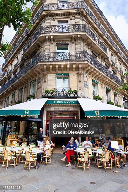 cafe les deux magots, parís. - les deux magots photos et images de collection