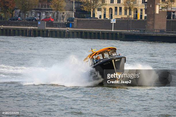 water taxi on the new meuse at rotterdam - båttaxi bildbanksfoton och bilder