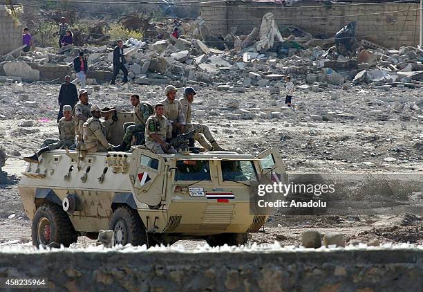 An armoured vehicle of Egyptian army is seen as they blow up buildings as part of an operation aiming to create a buffer zone at the Rafah border in...