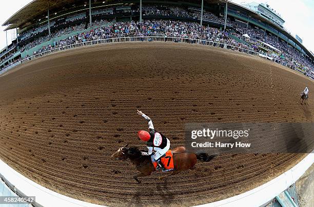 Jockey Kent Desormeaux celebrates atop Texas Red after winning the 2014 Sentient Jet Breeders' Cup Juvenile at Santa Anita Park on November 1, 2014...