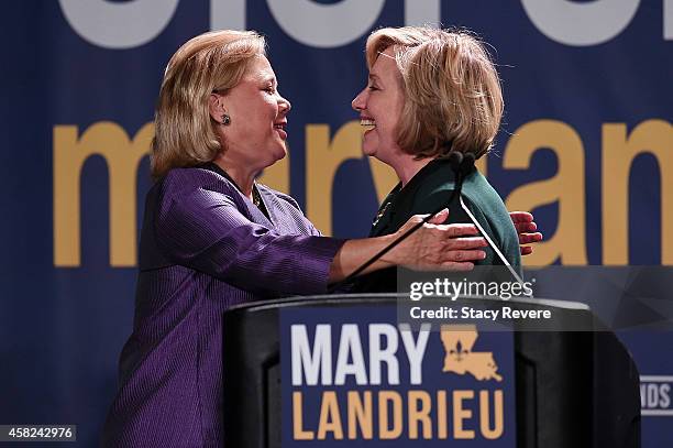 Sen. Mary Landrieu embraces former Secretary of State Hillary Clinton following the "Women with Mary Geaux Vote" event at the Sugar Mill on November...