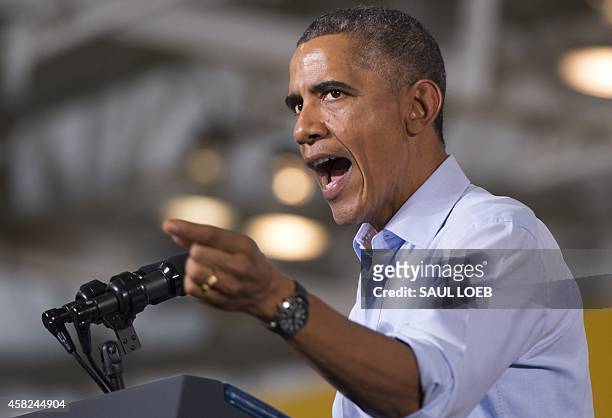 President Barack Obama speaks at a Democratic campaign rally for US Senate candidate Gary Peters and candidate for Michigan Governor Mark Schauer at...