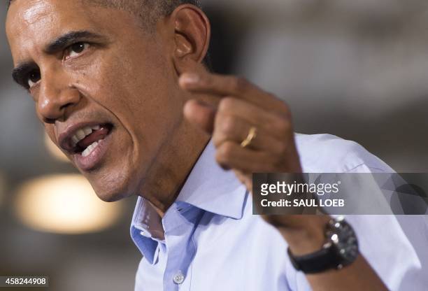 President Barack Obama speaks at a Democratic campaign rally for US Senate candidate Gary Peters and candidate for Michigan Governor Mark Schauer at...