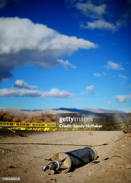 Debris from SpaceShipTwo lies in a desert field on November 1 in Mojave, California. The Virgin Galactic SpaceShipTwo crashed on October 31, 2014...