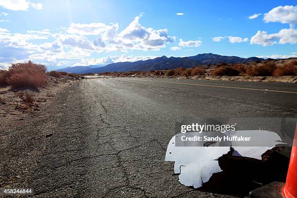 Debris from SpaceShipTwo lies on the road on November 1 in Mojave, California. The Virgin Galactic SpaceShipTwo crashed on October 31, 2014 during a...