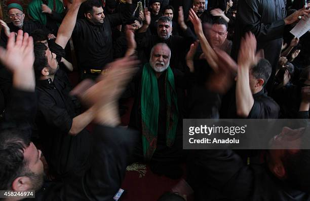 Shiite Muslims perform during the mourning ceremony held for the Karbala martyrs ,in month Muharram, one of the four sacred months of the year...