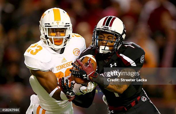 Cameron Sutton of the Tennessee Volunteers breaks up a pass to Damiere Byrd of the South Carolina Gamecocks during their game at Williams-Brice...