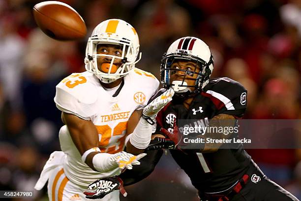 Cameron Sutton of the Tennessee Volunteers breaks up a pass to Damiere Byrd of the South Carolina Gamecocks during their game at Williams-Brice...