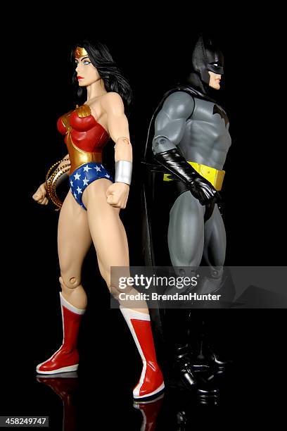 backs together - justice league superhero team stock pictures, royalty-free photos & images