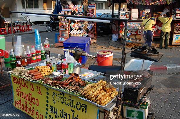 skeewers food stall, chiang mai - thailand - chiang mai sunday market stock pictures, royalty-free photos & images