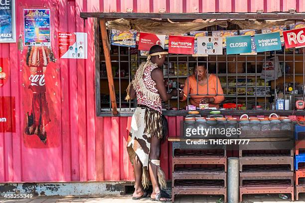 african man shopping at the spaza - soweto bildbanksfoton och bilder