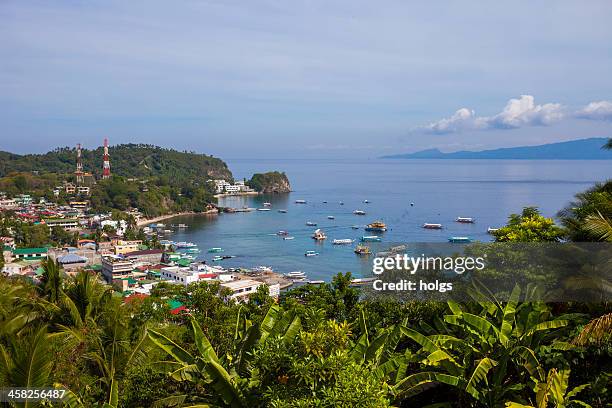 puerto galera view over sabang, philippines - gallera stock pictures, royalty-free photos & images
