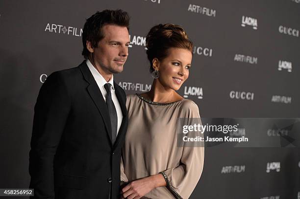 Director Len Wiseman and actress Kate Beckinsale, wearing Gucci, attend the 2014 LACMA Art + Film Gala honoring Barbara Kruger and Quentin Tarantino...