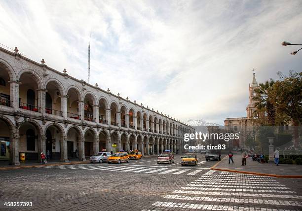 peruvian arcade surrounding town square - arequipa peru stock pictures, royalty-free photos & images