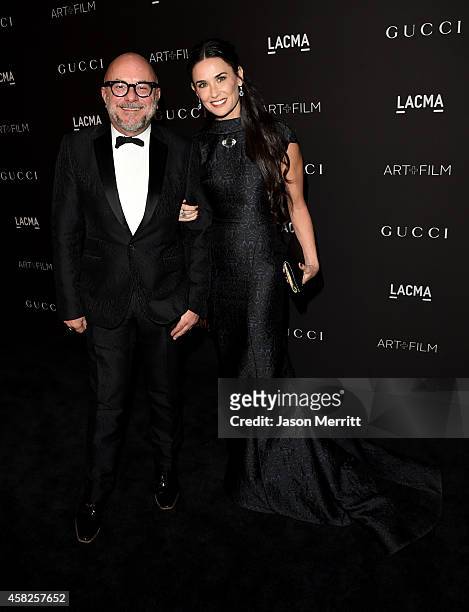 Eric Buterbaugh actress Demi Moore attend the 2014 LACMA Art + Film Gala honoring Barbara Kruger and Quentin Tarantino presented by Gucci at LACMA on...