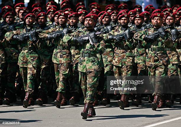 soldiers march during a parade - sri lanka commando stock pictures, royalty-free photos & images