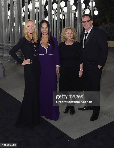 Creative Director of Gucci Frida Giannini, LACMA trustee and Art + Film Gala co-chair Eva Chow, wearing Gucci, and honorees Barbara Kruger and...