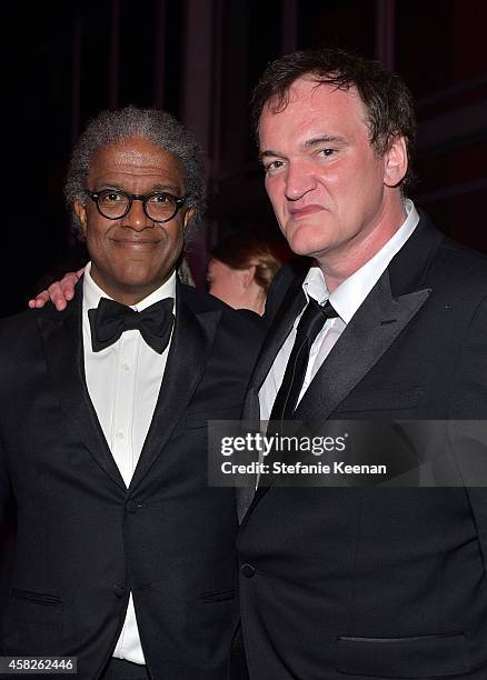 Film Independent curator at LACMA Elvis Mitchell and honoree Quentin Tarantino, wearing Gucci attend the 2014 LACMA Art + Film Gala honoring Barbara...