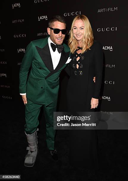 Lapo Elkann, wearing Gucci, and Gucci Creative Director Frida Giannini, wearing Gucci attend the 2014 LACMA Art + Film Gala honoring Barbara Kruger...