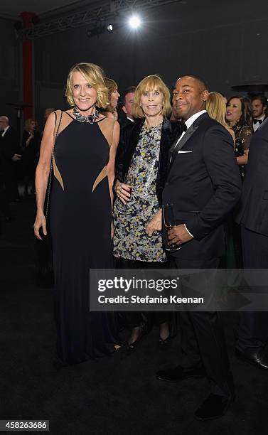 Grazka Taylor, Laura Maslon and curator Franklin Sirmans attend the 2014 LACMA Art + Film Gala honoring Barbara Kruger and Quentin Tarantino...