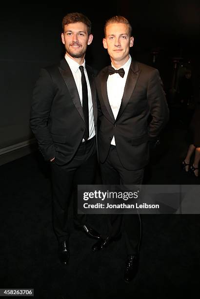 Actor Alex Pettyfer, wearing Gucci, and Alexander Rankovic attend the 2014 LACMA Art + Film Gala honoring Barbara Kruger and Quentin Tarantino...