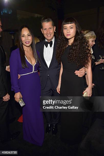 Designer Eva Chow, wearing Gucci,, editor of W Magazine Stefano Tonchi and Asia Chow attend the 2014 LACMA Art + Film Gala honoring Barbara Kruger...
