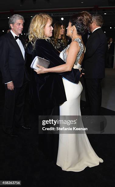 Actresses Rosanna Arquette and Salma Hayek Pinault, wearing Gucci, attend the 2014 LACMA Art + Film Gala honoring Barbara Kruger and Quentin...