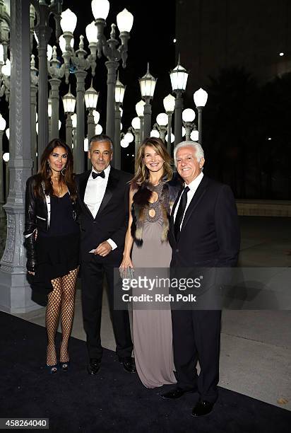 Guests and designer Paul Marciano attend the 2014 LACMA Art + Film Gala honoring Barbara Kruger and Quentin Tarantino presented by Gucci at LACMA on...