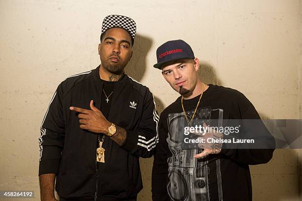 Dlo Rapper Rappers Clyde Carson and Paul Wall pose backstage during day 1 of ...