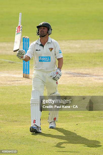 Ed Cowan of Tasmania throws his bat in the air after being dismissed during day three of the Sheffield Shield match between Western Australia and...