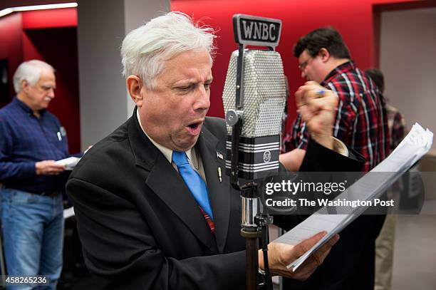 Edgar Russell III, center, the announcer in the "Lone Ranger," reads from his script at WAMU 88.5 FM, American University Radio, in Washington, D.C.,...