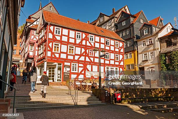 small street am schuhmarkt of marburg, germany - half timbered stock pictures, royalty-free photos & images