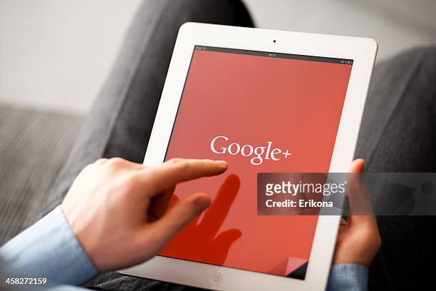 google plus on ipad - google social networking service stock pictures, royalty-free photos & images