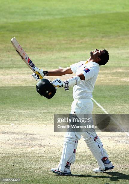 Azhar Ali of Pakistan celebrates reaching his century during Day Four of the Second Test between Pakistan and Australia at Sheikh Zayed Stadium on...