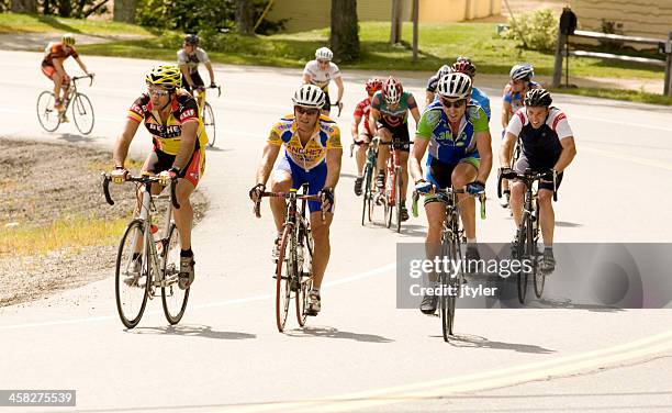 cycling competitors - white spandex shorts stockfoto's en -beelden