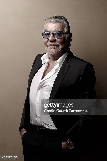 Designer Roberto Cavalli poses during the Vogue Fashion Dubai Experience on November 1, 2014 in Dubai, United Arab Emirates.