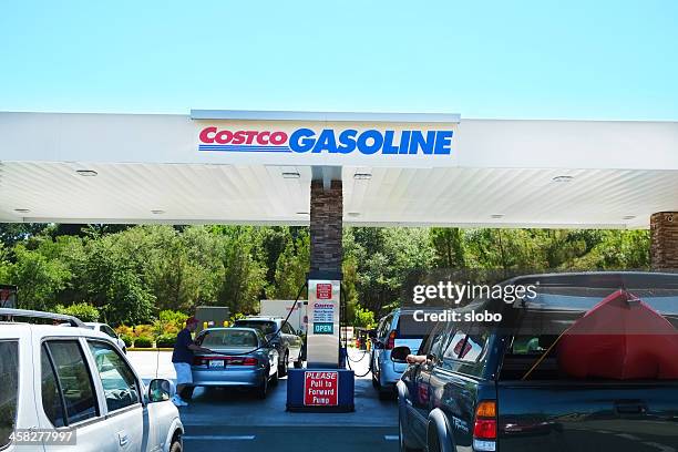 costco gasoline pump - premium gasoline stock pictures, royalty-free photos & images