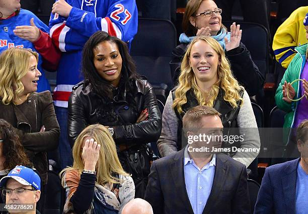 Serena Williams and Caroline Wozniacki attend New York Rangers vs Winnipeg Jets at Madison Square Garden on November 1, 2014 in New York City.