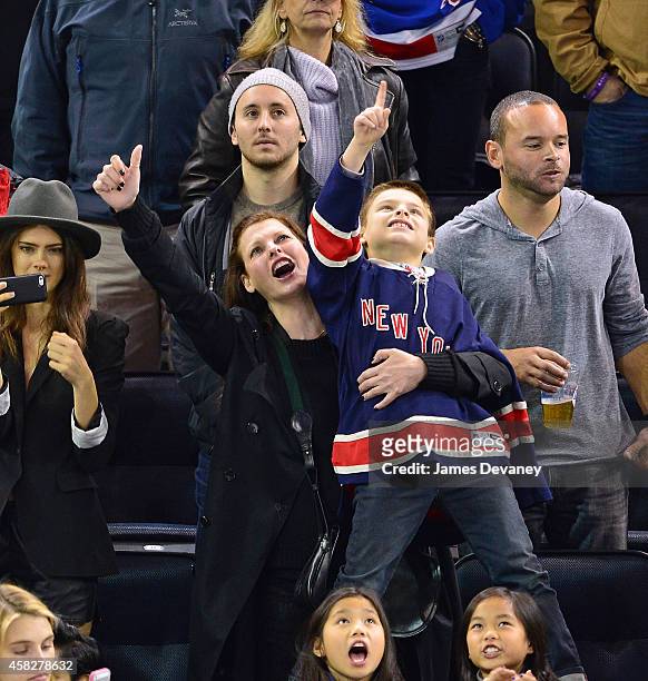 Linda Evangelista and son Augustin James Evangelista attend New York Rangers vs Winnipeg Jets at Madison Square Garden on November 1, 2014 in New...