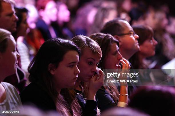 An audience looks on during a public memorial service in memory of murdered schoolgirl Alice Gross held at Greenford Town Hall on November 2, 2014 in...