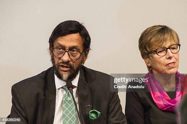 Rajendra K. Pachauri , chair of the IPCC, and Renate Christ , secretary of the IPCC attend the press conference about the fifth assessment report...