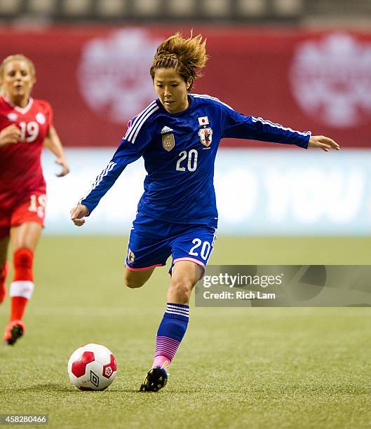 Asano Nagasato of Japan runs with the ball during Women's International Soccer Friendly Series action against Canada on October 28, 2014 at BC Place...