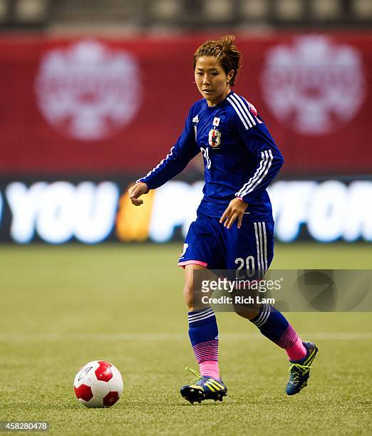 Asano Nagasato of Japan runs with the ball during Women's International Soccer Friendly Series action against Canada on October 28, 2014 at BC Place...