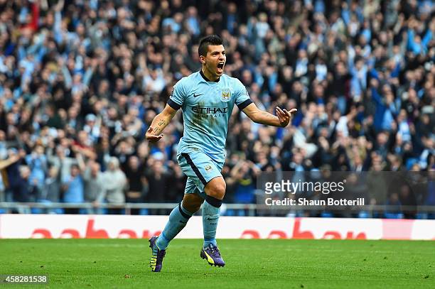 Sergio Aguero of Manchester City celebrates scoring the opening goal during the Barclays Premier League match between Manchester City and Manchester...