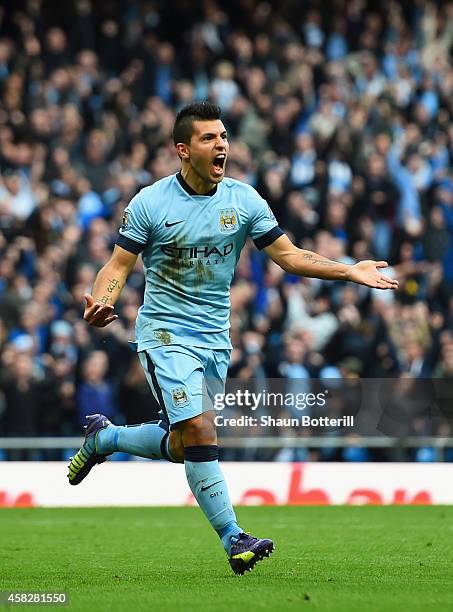 Sergio Aguero of Manchester City celebrates scoring the opening goal during the Barclays Premier League match between Manchester City and Manchester...